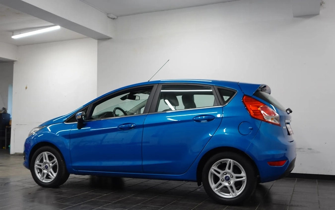 Ford Fiesta cena 26900 przebieg: 166556, rok produkcji 2013 z Wołów małe 781